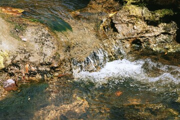 river flowing into the rocks