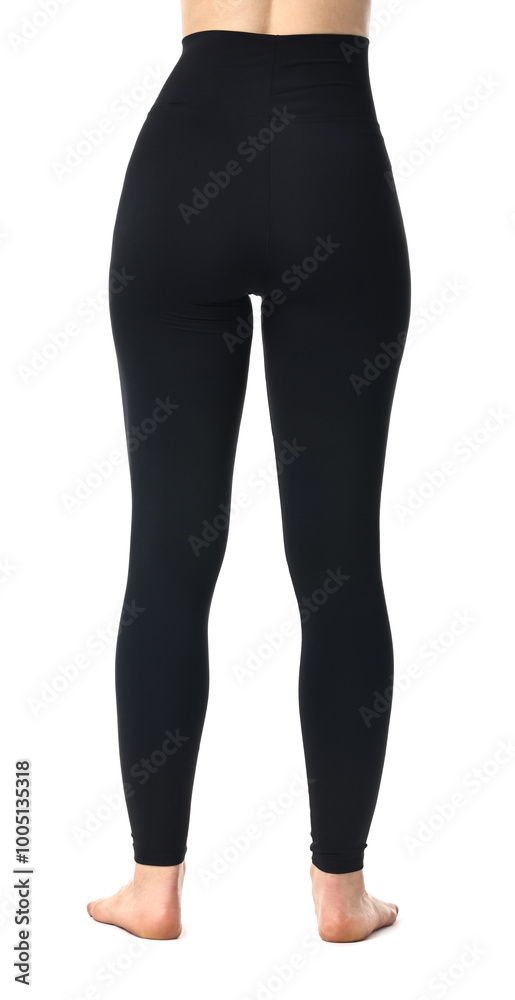 Poster Woman wearing black sports leggings on white background, closeup