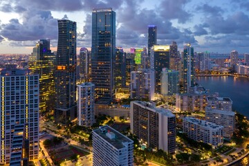 Fototapeta premium Downtown Miami waterfront, buidings and condos at night, Florida, United States.