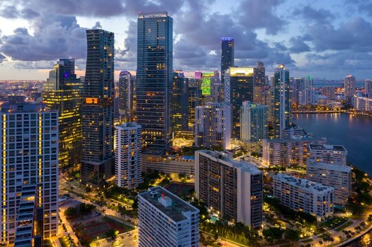 Fototapeta Downtown Miami waterfront, buidings and condos at night, Florida, United States.