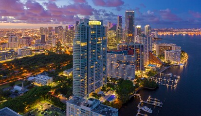 Downtown Miami waterfront, buidings and condos at night, Florida, United States.