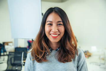 Portrait Asian women happiness smiling laugh happy person looking at camera. Beautiful happy girl portrait joy cheerful. Beauty women smile laughing. Confidence females candid shot smiling face.
