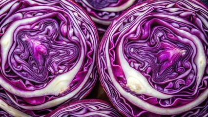 Obraz premium Close up top view of the raw purple cabbage cut in half , blue cabbage, background, texture, health, food, vegetarian
