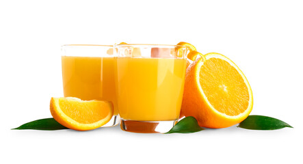 Glasses of fresh orange juice and leaves on white background