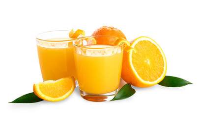 Glasses of fresh orange juice and leaves on white background