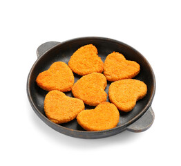 Frying pan with tasty nuggets in shape of heart on white background. Valentine's Day celebration