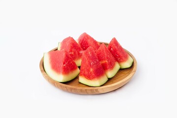 Whole watermelon and seeded slices seen front and top on a white background. Watermelon slices are...
