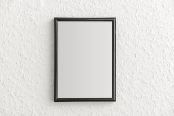 Black photo frame on light wall
