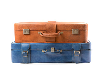 Brown and blue retro leather suitcases  on white background