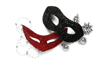 Beautiful carnival masks with Christmas decor on white background