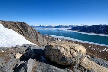 A remote wilderness tundra, where the ground is covered in a blanket of snow and ice, and the landscape stretches endlessly into the distance.
