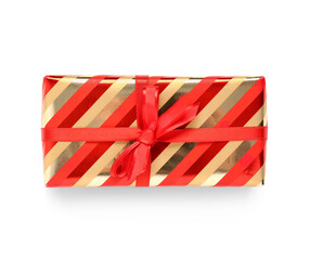 Christmas gift box with red ribbon on white background