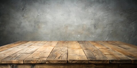 Rustic wooden table top on neutral gray backdrop close-up
