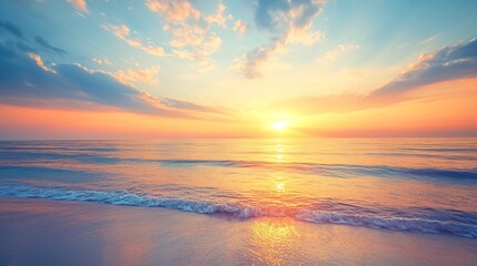 Fototapeta premium Beautiful sunrise over the ocean with clouds and a sandy beach.