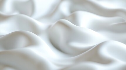 Fototapeta premium A close-up of soft, flowing white fabric creating a smooth, elegant texture.