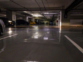 Ample car parking in the ground of the office building.