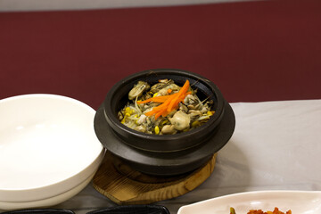 Korea food. Hot pot oyster rice