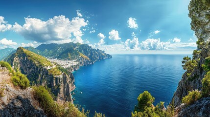 Obraz premium Breathtaking panoramic view of mountains and clear ocean under a bright blue sky, perfect for nature and travel enthusiasts.