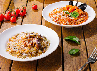 Gourmet italian pasta dishes on rustic wooden table