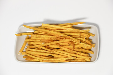 Sweet potato sticks on white background