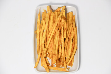 Sweet potato sticks on white background