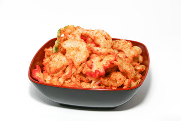 Kerupuk seblak kering Bandung, Traditional Spicy Cracker with star shape from West Java, Indonesia Background