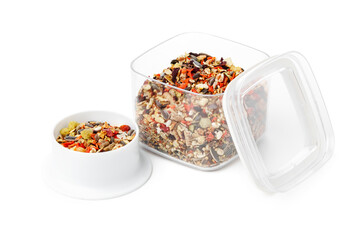 Nutritious seed mix served in a bowl with additional snacks for pet at home