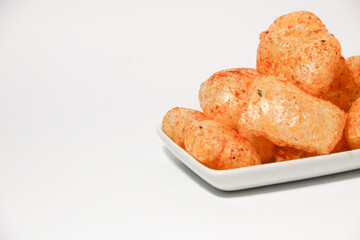 Kerupuk kulit (rambakjangekkrecekkarodok) are a traditional Indonesian snack made from cow or sheep skin, with a spicy taste.