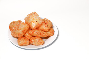 Kerupuk kulit (rambakjangekkrecekkarodok) are a traditional Indonesian snack made from cow or sheep skin, with a spicy taste.