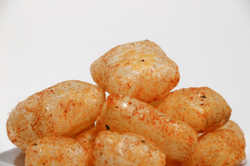 Kerupuk kulit (rambakjangekkrecekkarodok) are a traditional Indonesian snack made from cow or sheep skin, with a spicy taste.