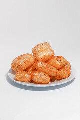 Kerupuk kulit (rambakjangekkrecekkarodok) are a traditional Indonesian snack made from cow or sheep skin, with a spicy taste.