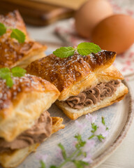 Miguelitos with chocolate truffle cream. Spanish chocolate puff pastry dessert