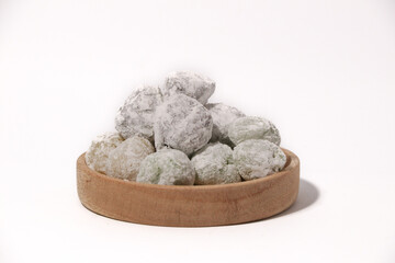 Mochi - trendy and sweet dessert, Mochi cake on a plate on a white background.