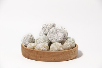 Mochi - trendy and sweet dessert, Mochi cake on a plate on a white background.