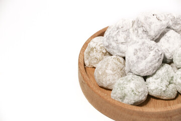 Mochi - trendy and sweet dessert, Mochi cake on a plate on a white background.