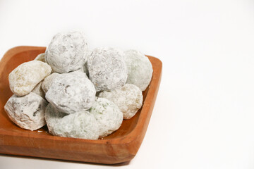 Mochi - trendy and sweet dessert, Mochi cake on a plate on a white background.