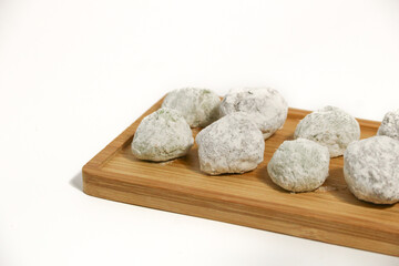 Mochi - trendy and sweet dessert, Mochi cake on a plate on a white background.