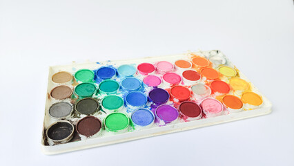 Set with strokes of colorful oil paints on white background, top view