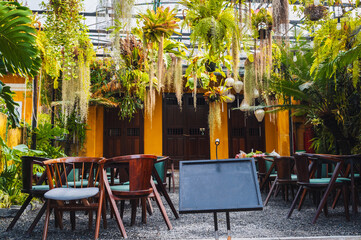 Interior of a cafe restaurant with landscaping in Vietnam in Asia