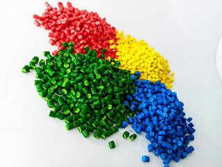 mix color masterbatch granules, colorful polymer granules, cold cutting type pigment raw material isolated with white background, for plastic product catalog design of manufacturing industry