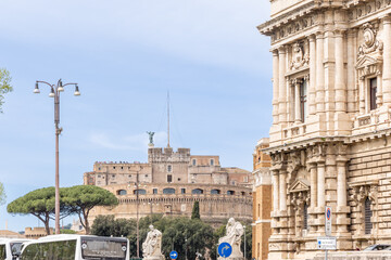 Obraz premium Rome, Italy - April 11, 2024: Rome, Italy - April 11, 2024: Rooftops and houses of the city of Rome, Italy