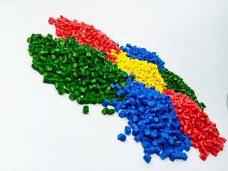 mix color masterbatch granules, colorful polymer granules, cold cutting type pigment raw material isolated with white background, for plastic product catalog design of manufacturing industry