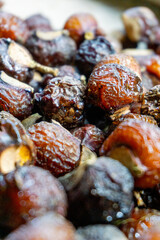 Sapindus rarak (Sapindus mukorossi, rerek, lamuran, Lerak). This fruit is made into a washing agent, a cleaner for various kitchen utensils, and soap.