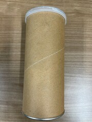 tin can on wooden background