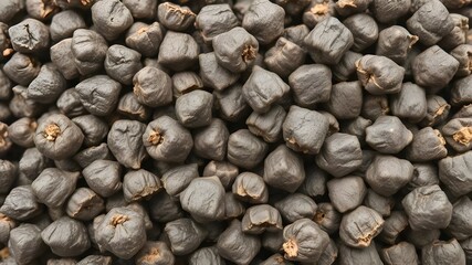 close up of a pile of peppercorns