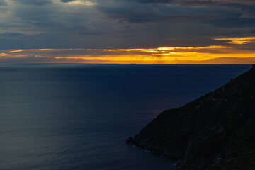 Fototapeta premium Incredible sunset over Ligurian Shore, Cinque Terre Manarola Italy