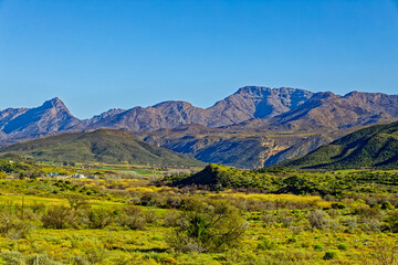 Swartberg mountains with light snow in winter near Calitzdorp in the Little Karoo, Western Cape...