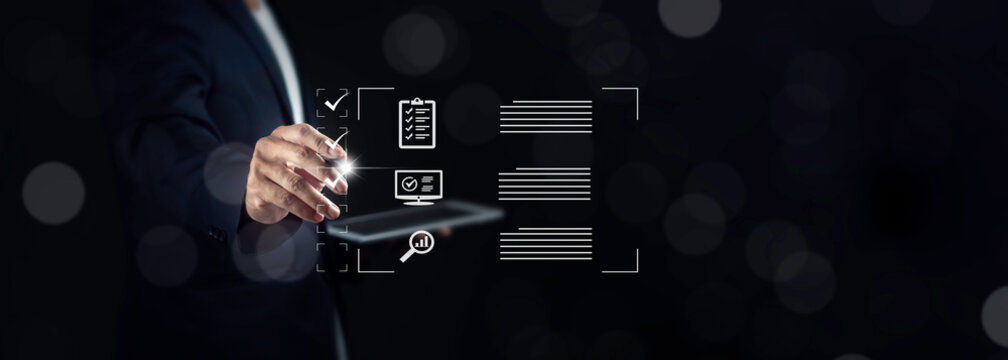 Businessman doing online checklist survey, filling out digital form, take an assessment, questionnaire, evaluation, online survey, online exam.