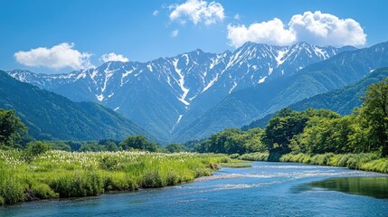 Majestic Hotaka Mountains overlooking the peaceful Azusa River in Kamikachi, surrounded by fresh greenery, capturing the untouched beauty of Nagano's natural landscape.