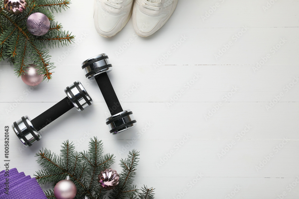 Canvas Prints Dumbbells, mat, sneakers, fir tree branches and Christmas baubles on white table, flat lay. Space for text